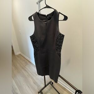 Banana Republic size 8P grey dress with black material detail on the side.